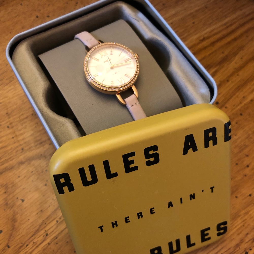 Fossil rose gold leather watch
